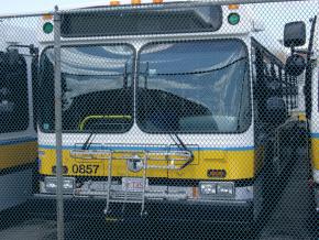 Public buses in Boston sit idle at a garage