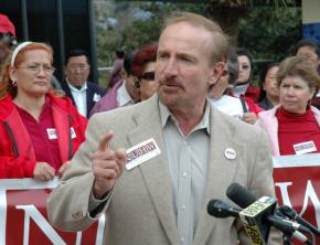 Sal Rosselli speaking to a press conference for home health care workers in Fresno