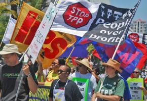 Activists in San Diego march against the Trans Pacific Partnership trade deal